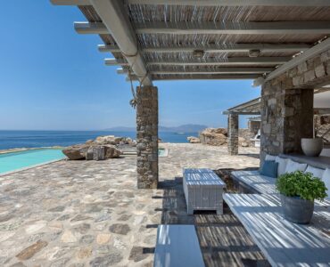 Pergola lounge by the pool at Villa Pergisos in Kanalia, Mykonos