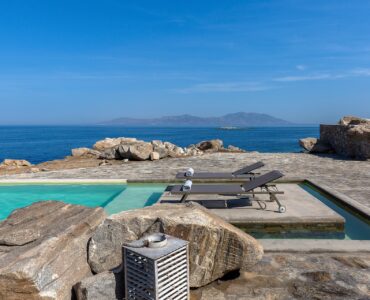 Pool among the rocks with sea view at Villa Pergisos in Kanalia, Mykonos