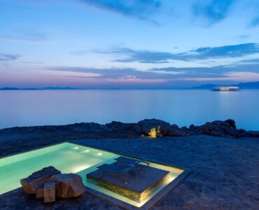 Pool at dusk at Villa Pergisos in Kanalia, Mykonos