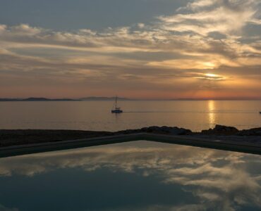 Pool at sunset at Villa Pergisos in Kanalia, Mykonos