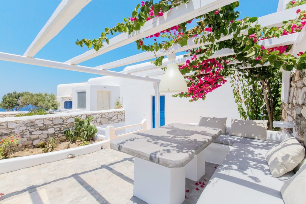 Pergola terrace with bougainvillea at Villa Phaedra in Pouli, Mykonos