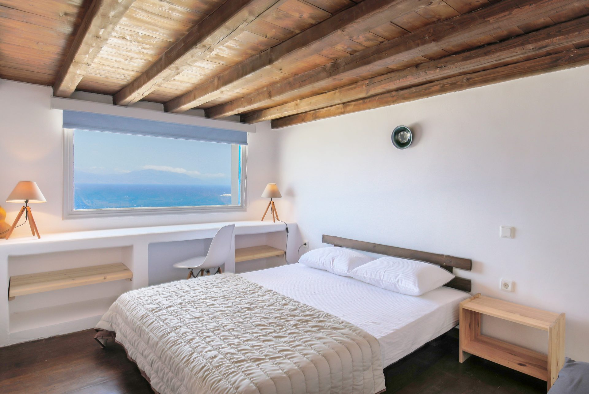 Double bedroom with sea view at Villa Phaedra in Pouli, Mykonos