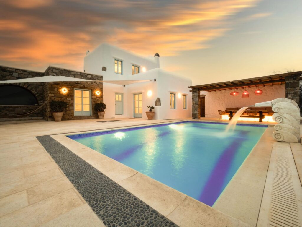 Private pool at sunset at Villa Uranos in Psarou, Mykonos