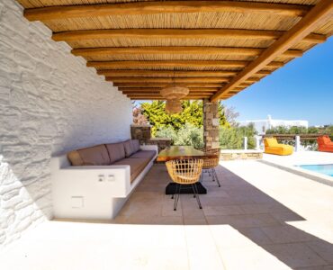 Shaded pergola lounge at Villa Uranos in Psarou, Mykonos