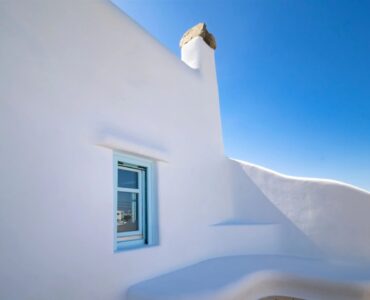 Whitewashed exterior detail at Villa Uranos in Psarou, Mykonos