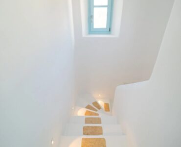Whitewashed staircase at Villa Uranos in Psarou, Mykonos